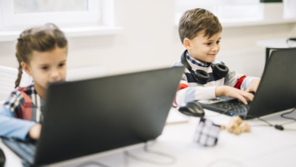 Children learning about technology.